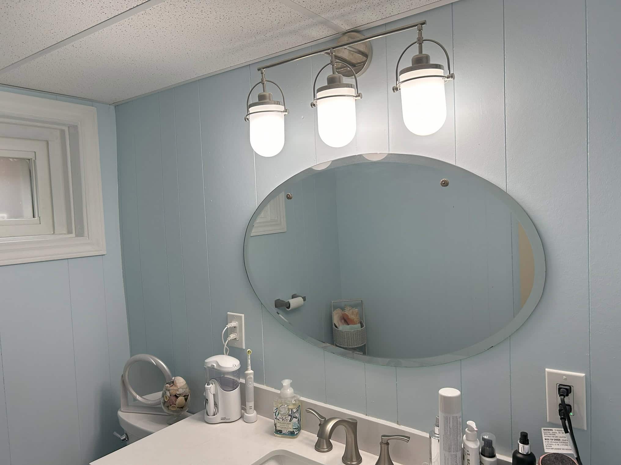 basement bathroom paneling painted in Etobicoke home