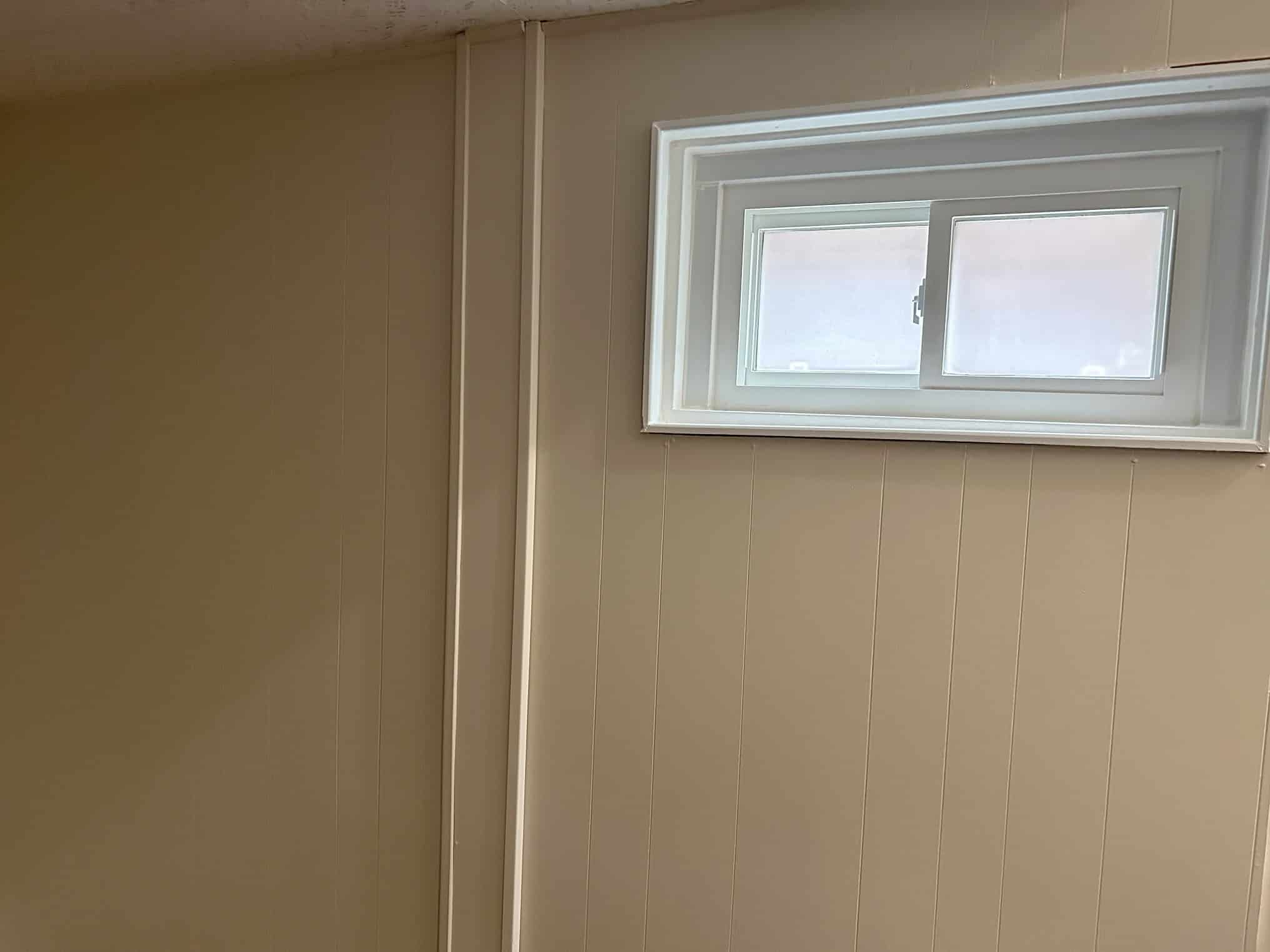 Basement paneling in Etobicoke home painted by Court-Hampton Painting Inc.